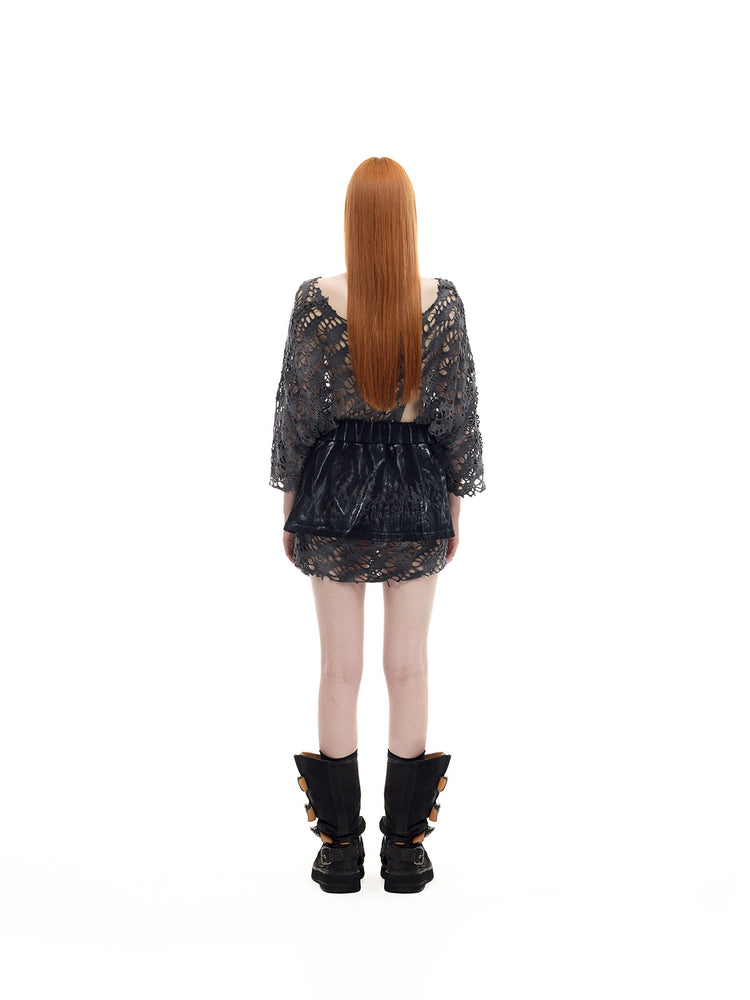 PINKSPINK ELECTRIC MOON distressed open-knit oversized tee in charcoal gray — full-length back modeled view with black shorts