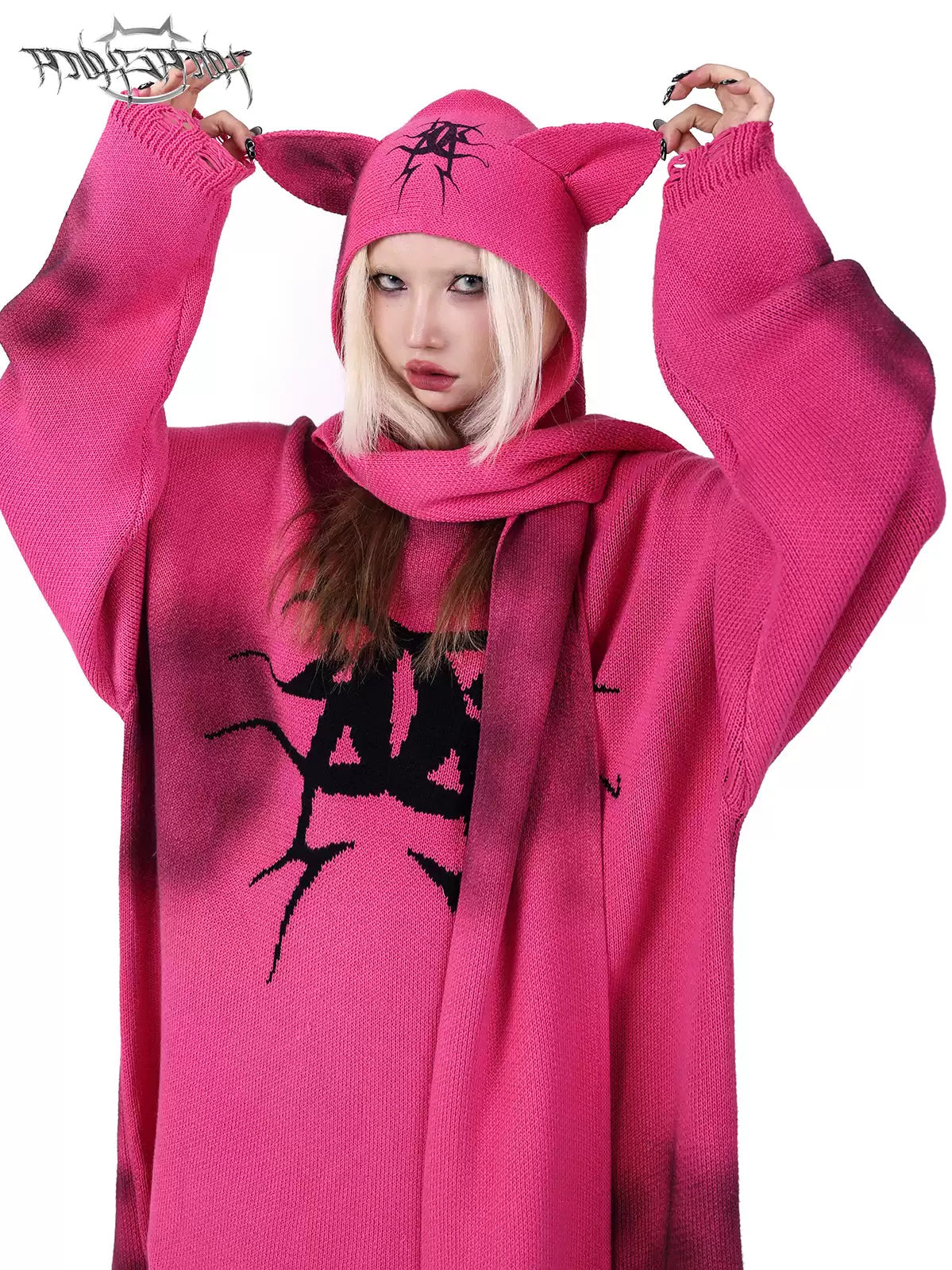 PINKSPINK SPHYNX cat-ear hooded scarf — close modeled view highlighting the construction