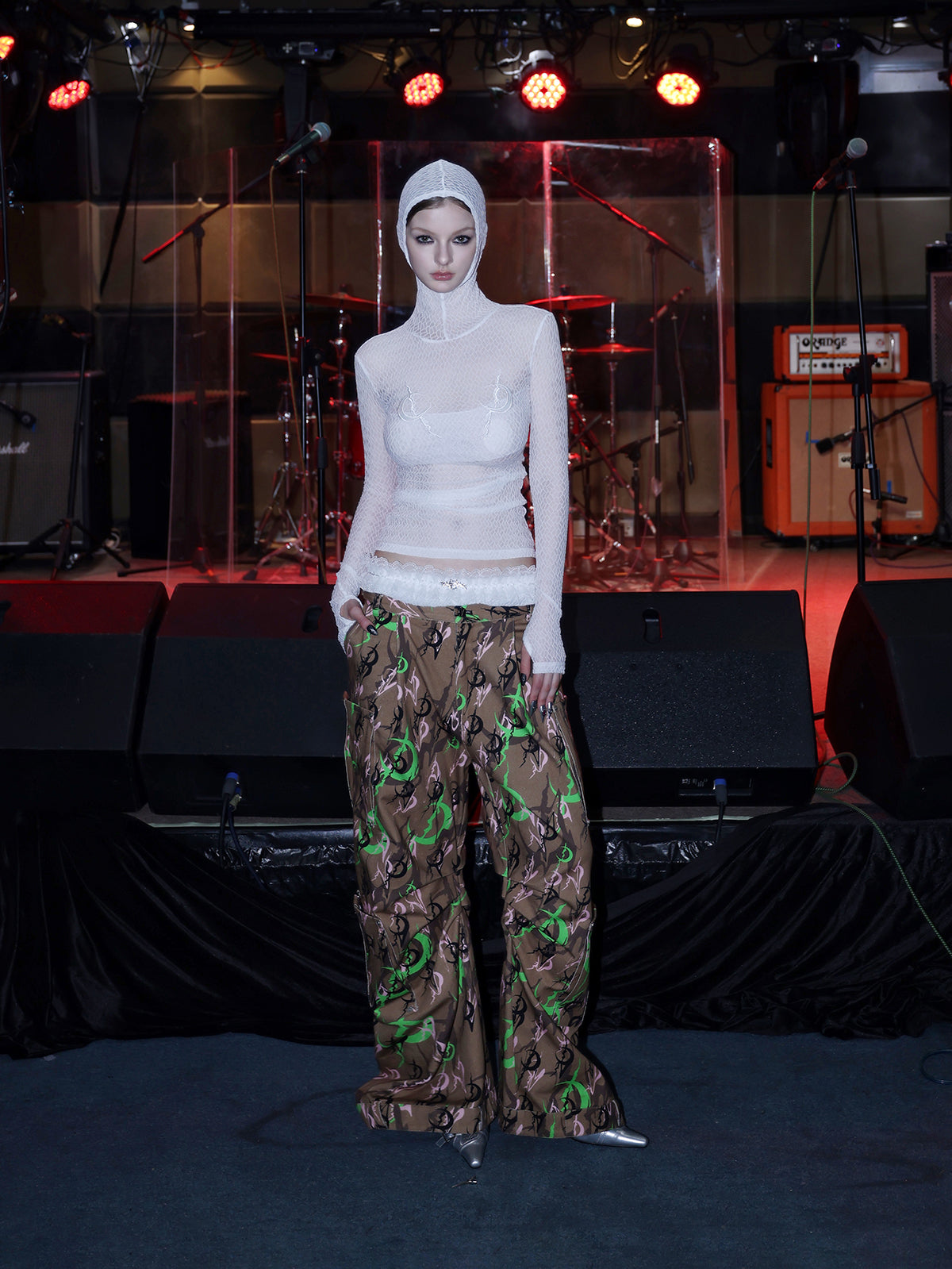 PINKSPINK ELECTRIC MOON hooded mesh top in WHITE — full front with cargo trousers.