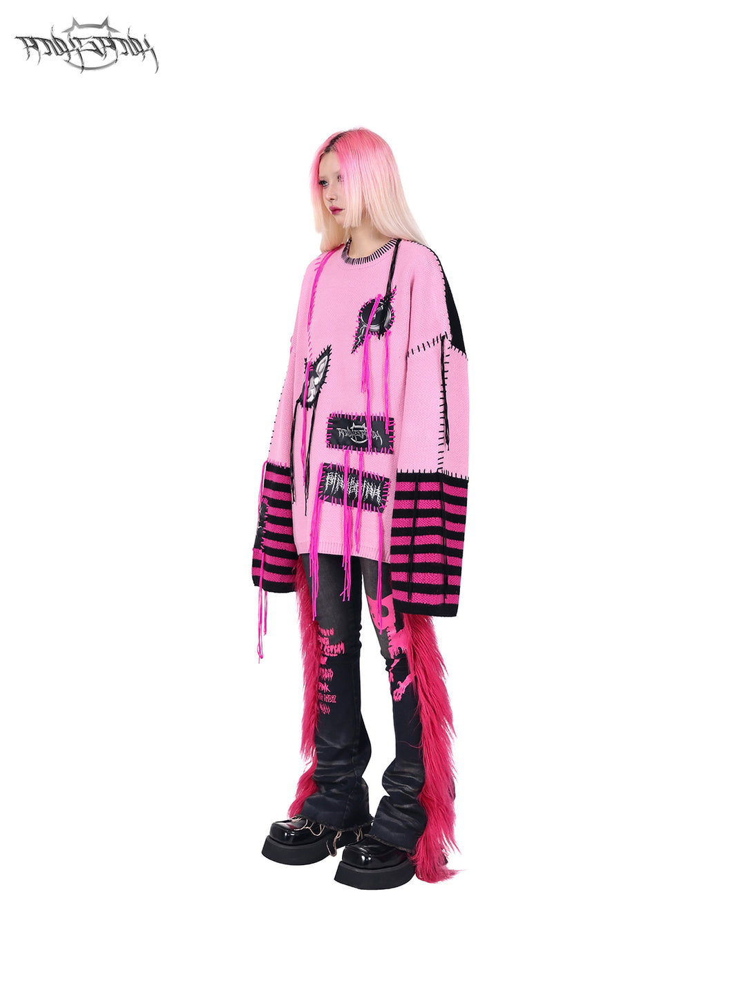PINKSPINK BARBIE faux-fur flared jeans in PINK — opposite three-quarter view with a pink sweater.