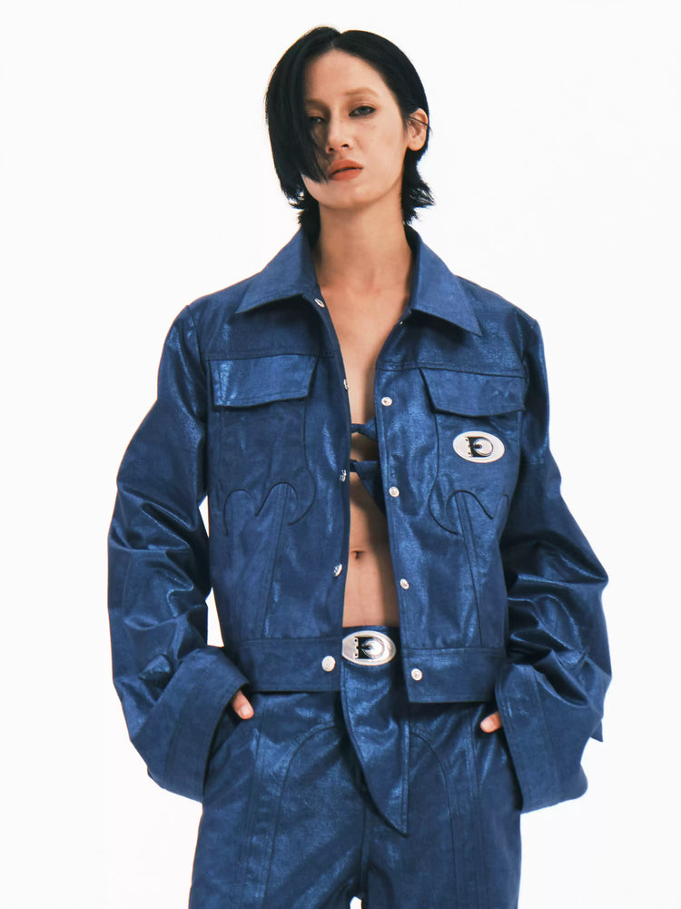 EMBRYO BLUE SPIKE metallic bell-sleeve jacket — blue front modeled view with jacket open and hands in pockets