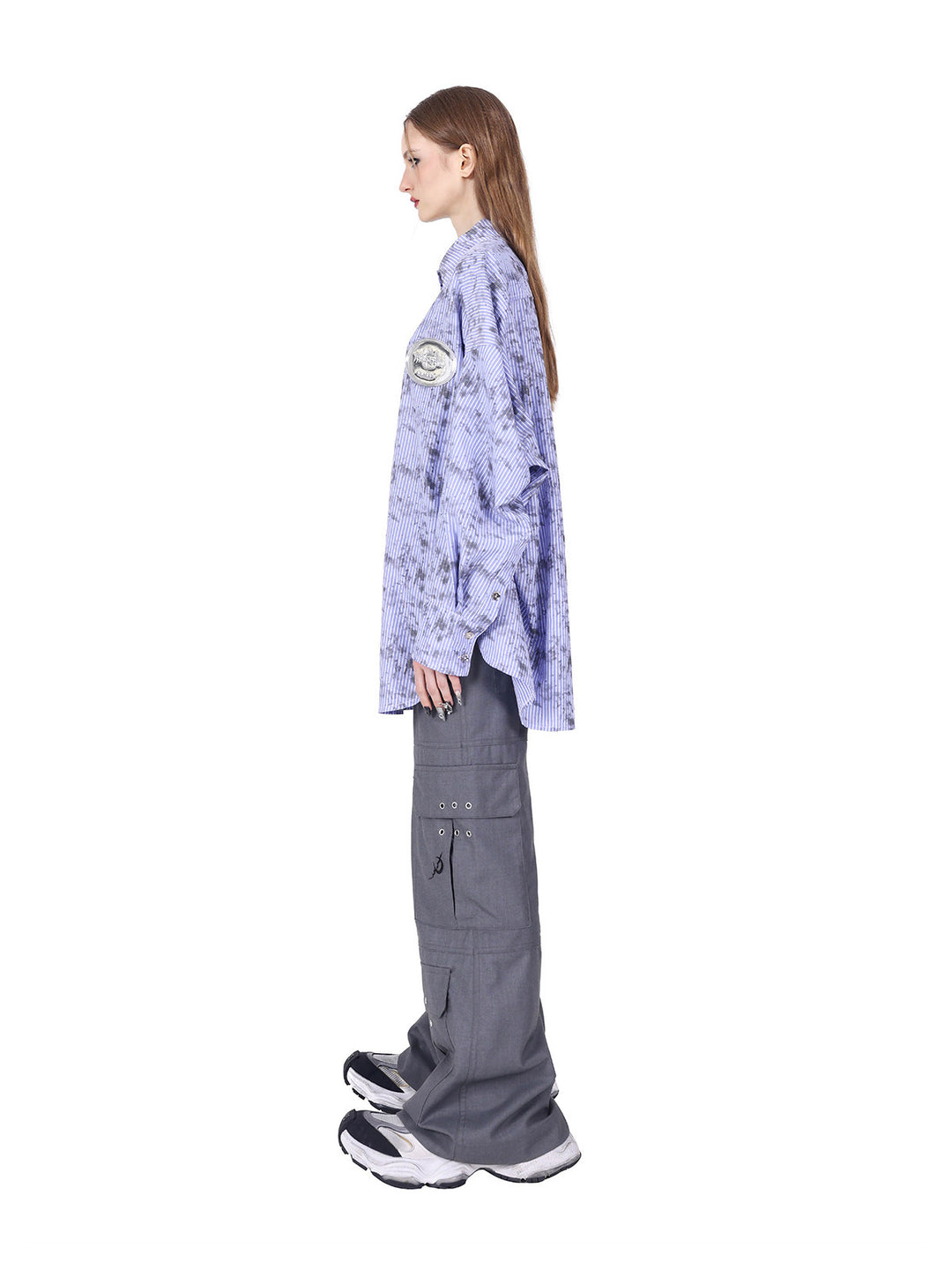 PINKSPINK ELECTRIC MOON ring-detail cargo flare trousers in gray — side view styled with a separate striped shirt and sneakers