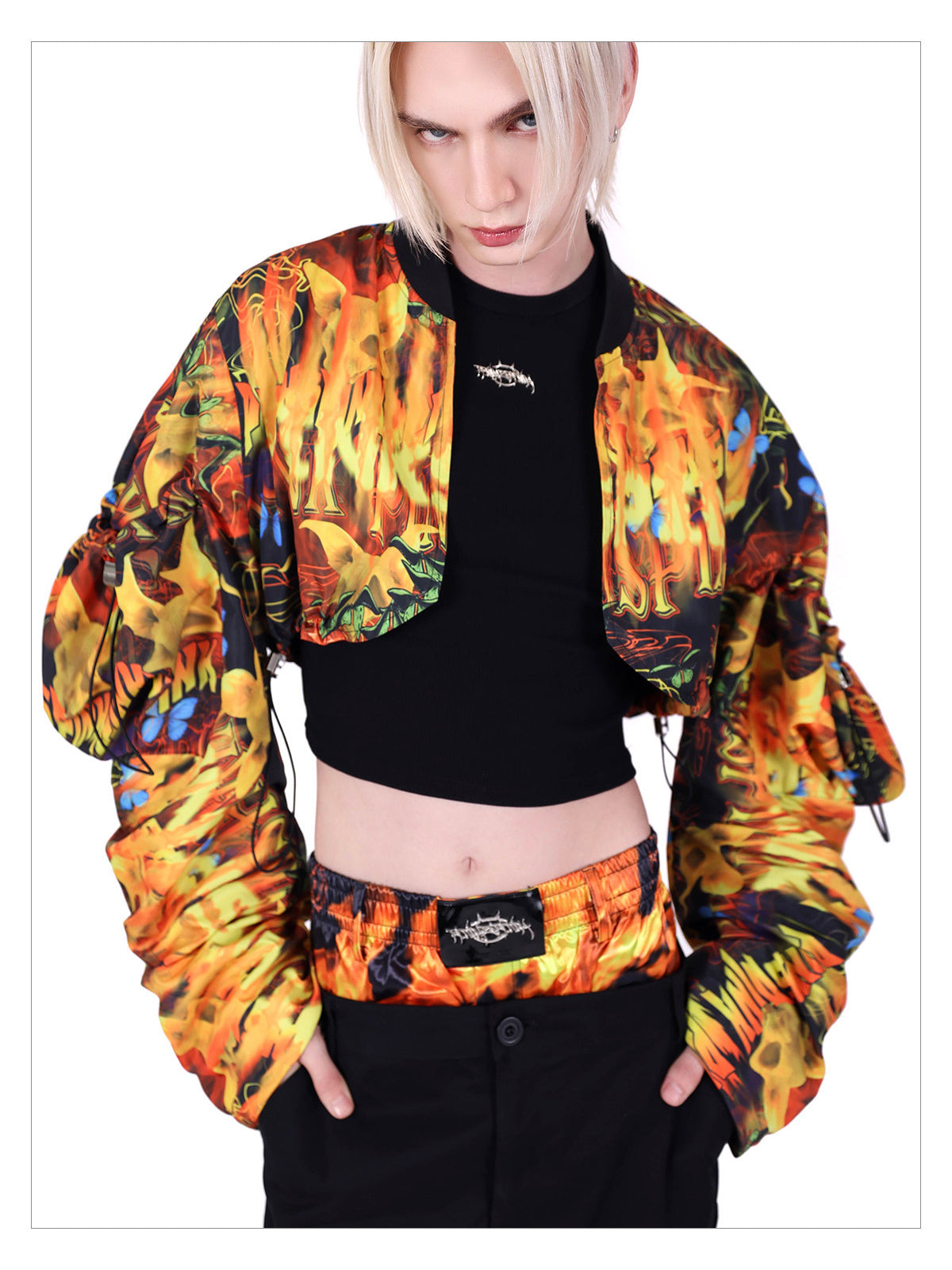 PINKSPINK FIRE VEIL cropped sun-protection top — product detail view showing texture and hardware