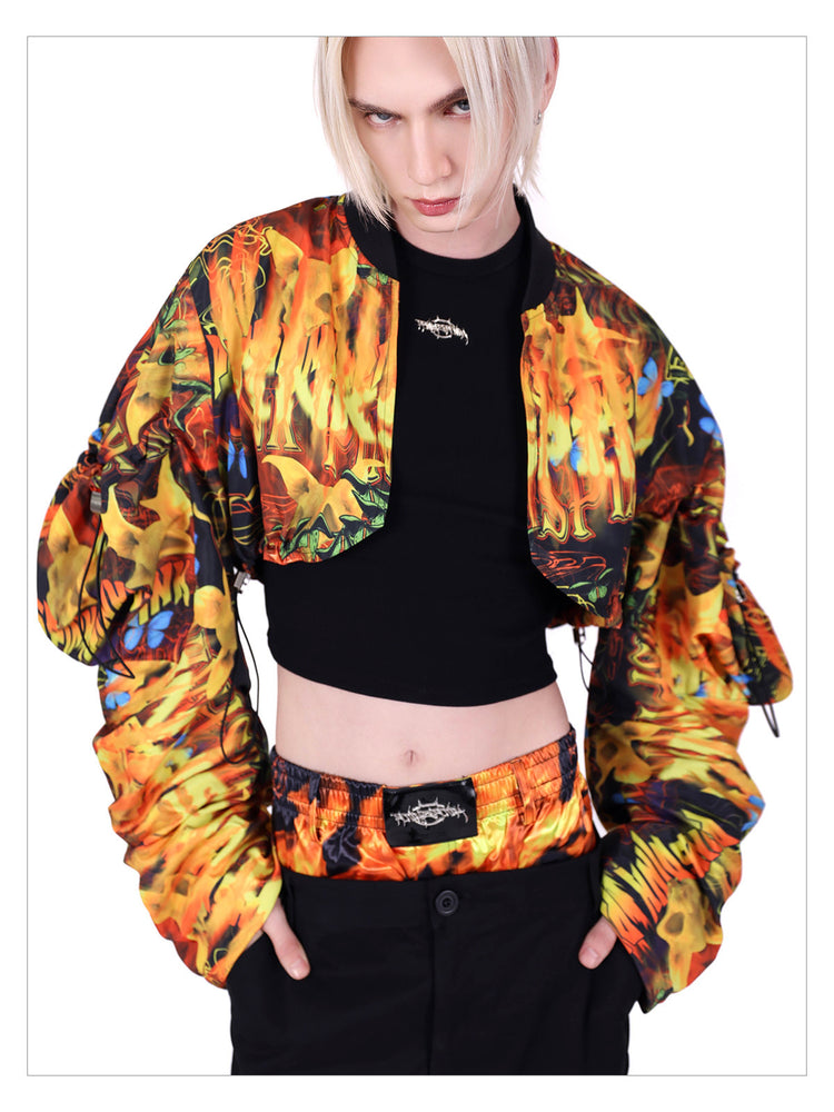 PINKSPINK FIRE VEIL cropped sun-protection top — product detail view showing texture and hardware