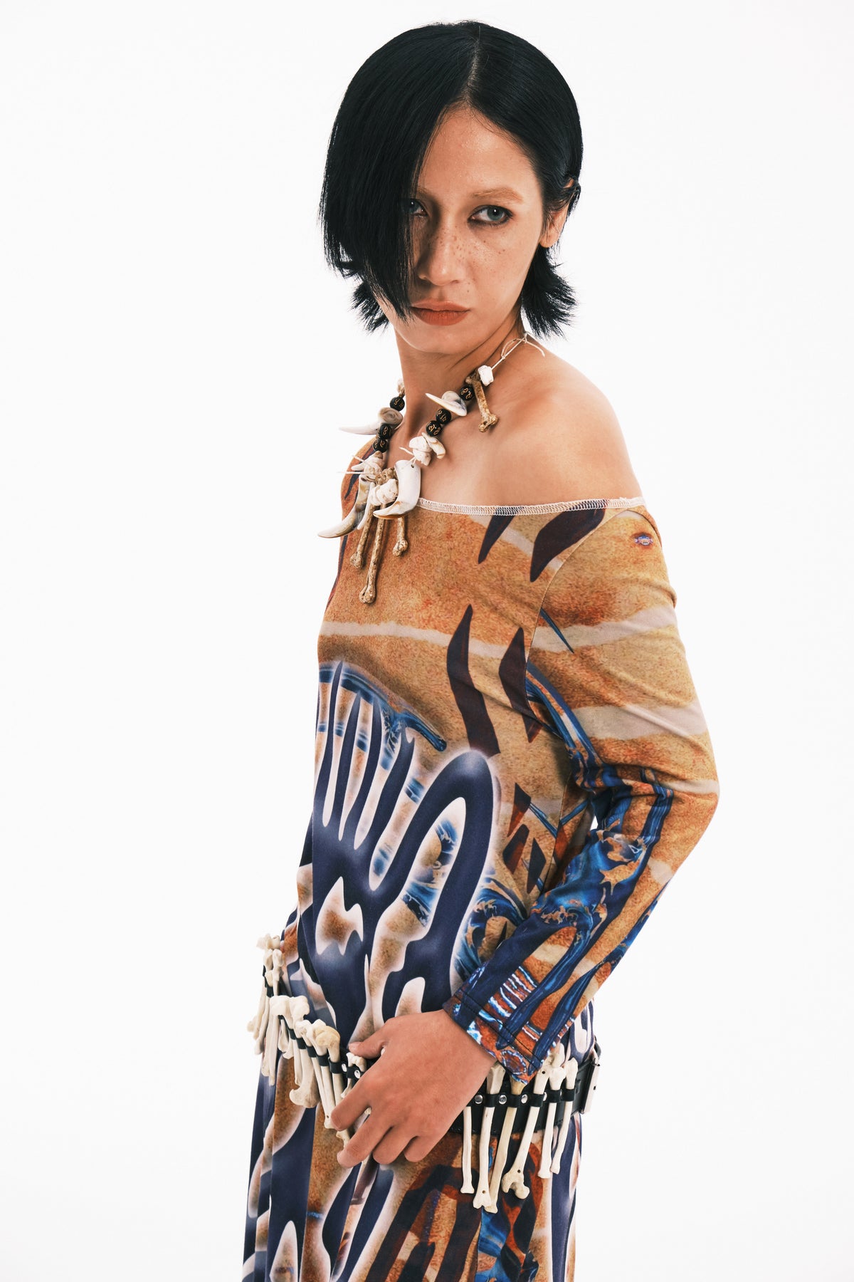 EMBRYO TRIBAL ENTITY off-shoulder maxi dress — material and hardware detail