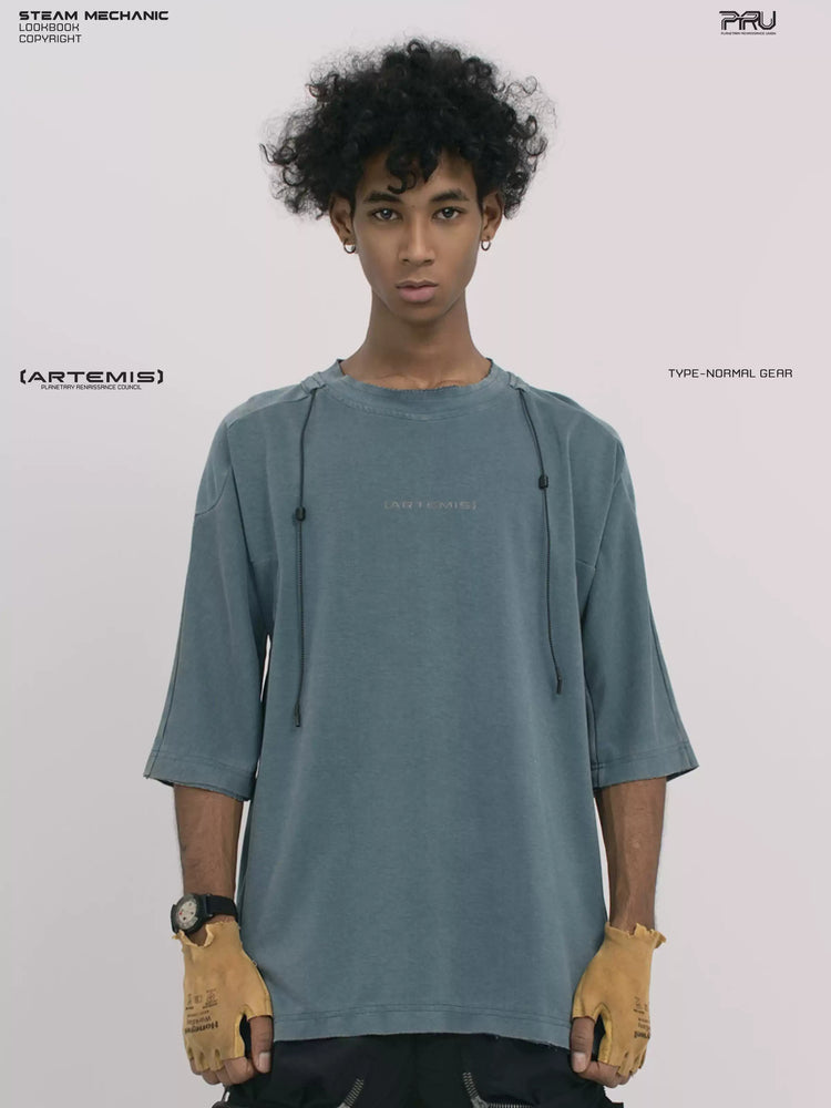 LIGHTSHADOW mycelium blue deconstructed technical tee — front three-quarter view with arms lowered