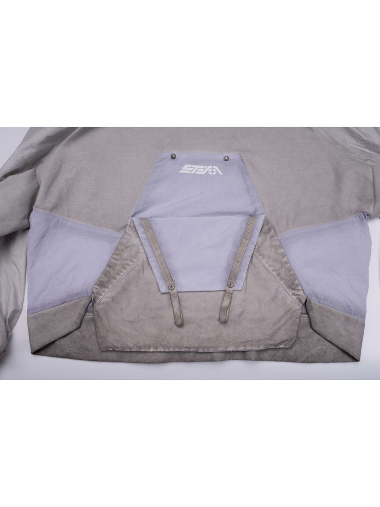 PIONEER eris white detachable-pocket utility hoodie — close-up of the opened chest pocket with reflective brand logo and hanging straps