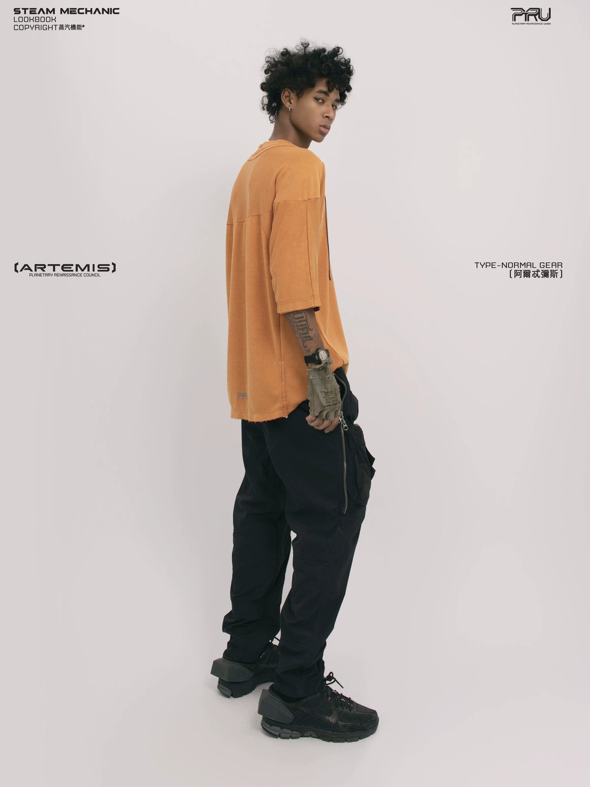 LIGHTSHADOW eclipse orange deconstructed technical tee — rear modeled view