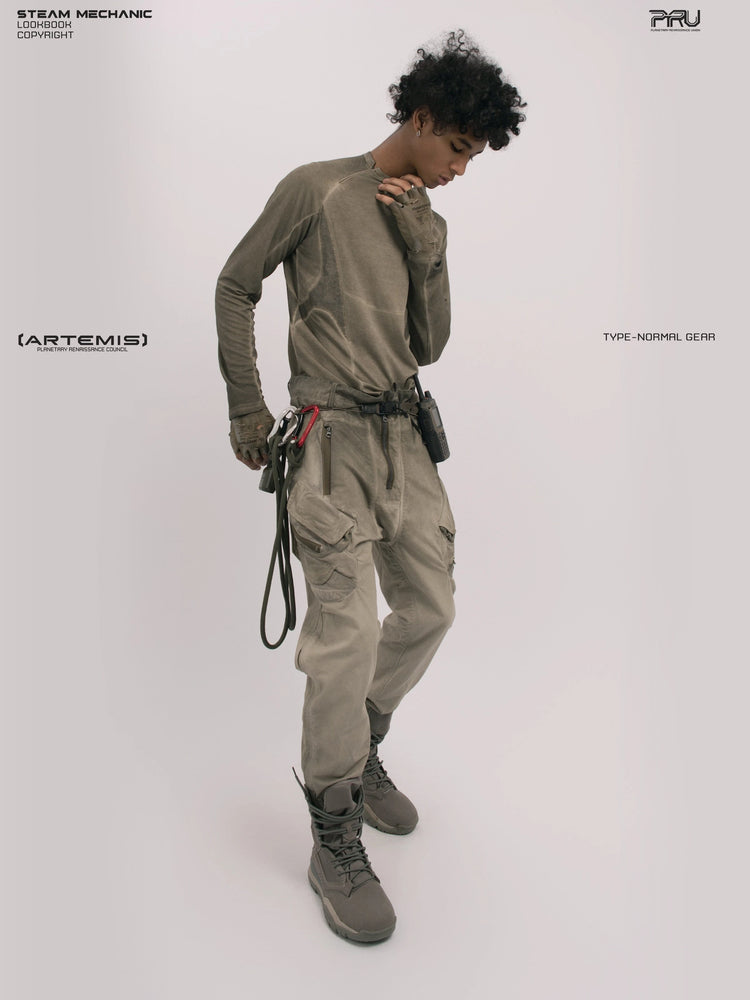 TWIN STAR lunar soil teal stretch riding base-layer top — full-length three-quarter view touching the collar