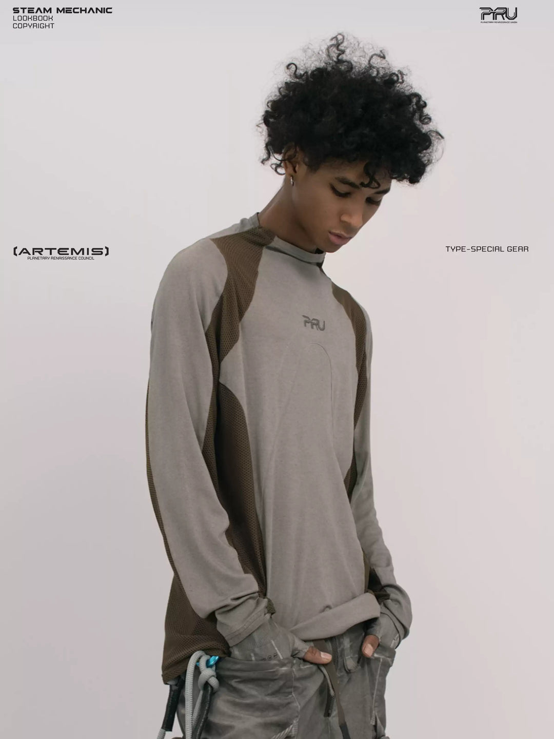 STARCORE ash tundra mesh-panel long-sleeve top b — front three-quarter modeled close-up looking down