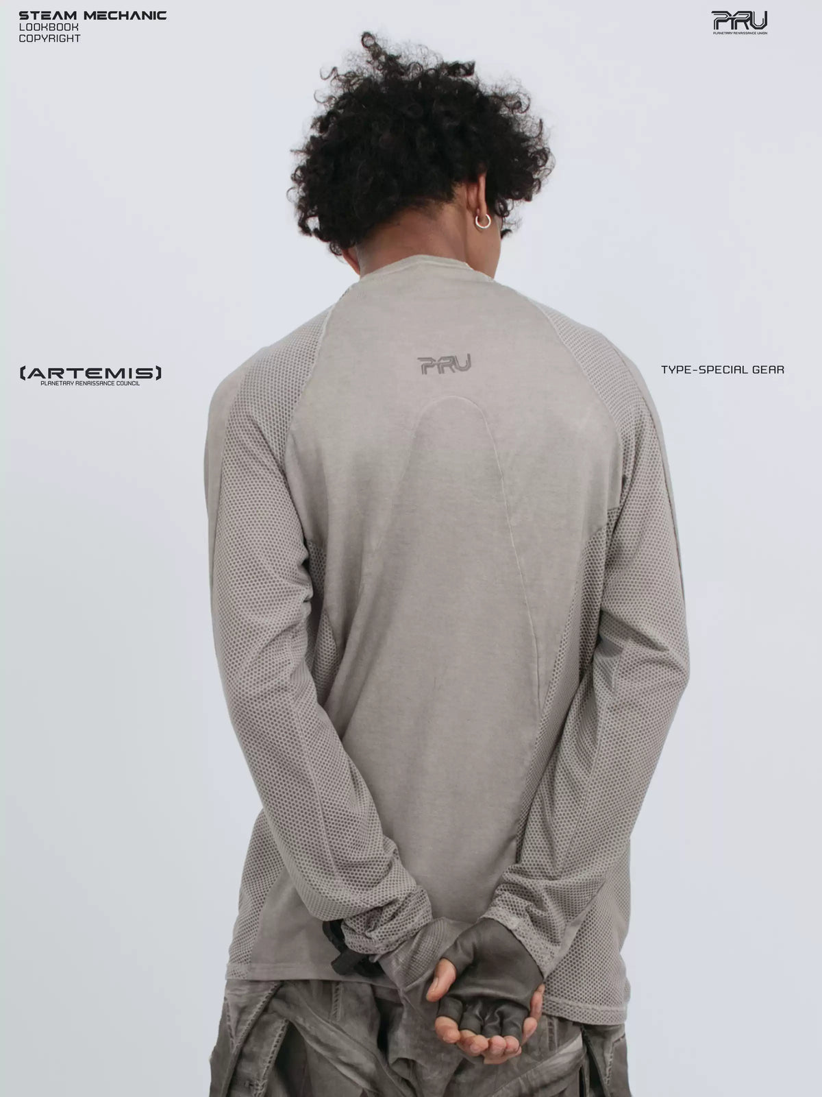 STARCORE mesh-panel long-sleeve top in dusk cloud gray — back modeled close-up showing curved seams