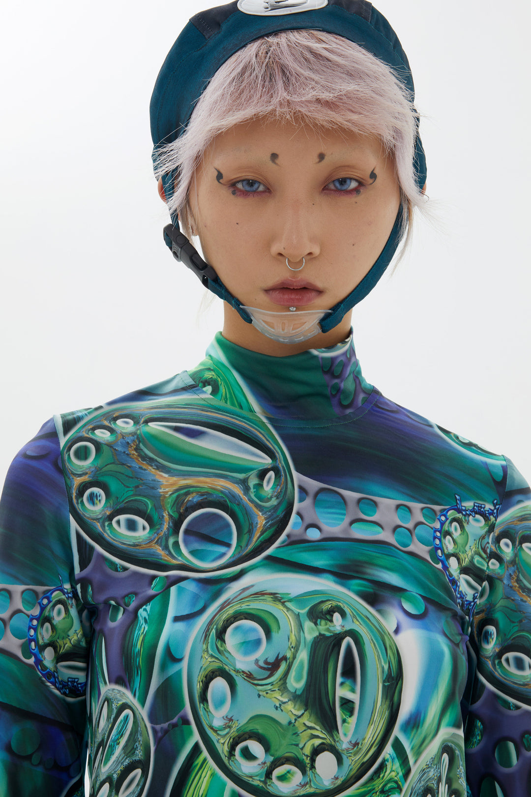 EMBRYO LARVA patchwork cycling cap — full-length modeled view