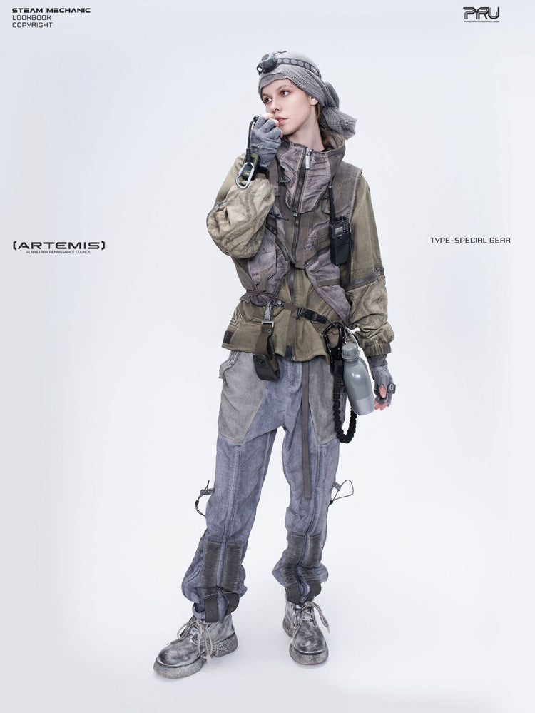 FISSION modular vest — mercury brown full-length modeled view with radio raised