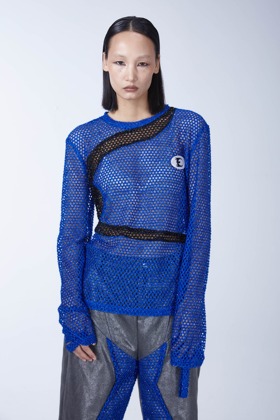 EMBRYO BLUE VOID cutout mesh finger-sleeve top — alternate modeled angle