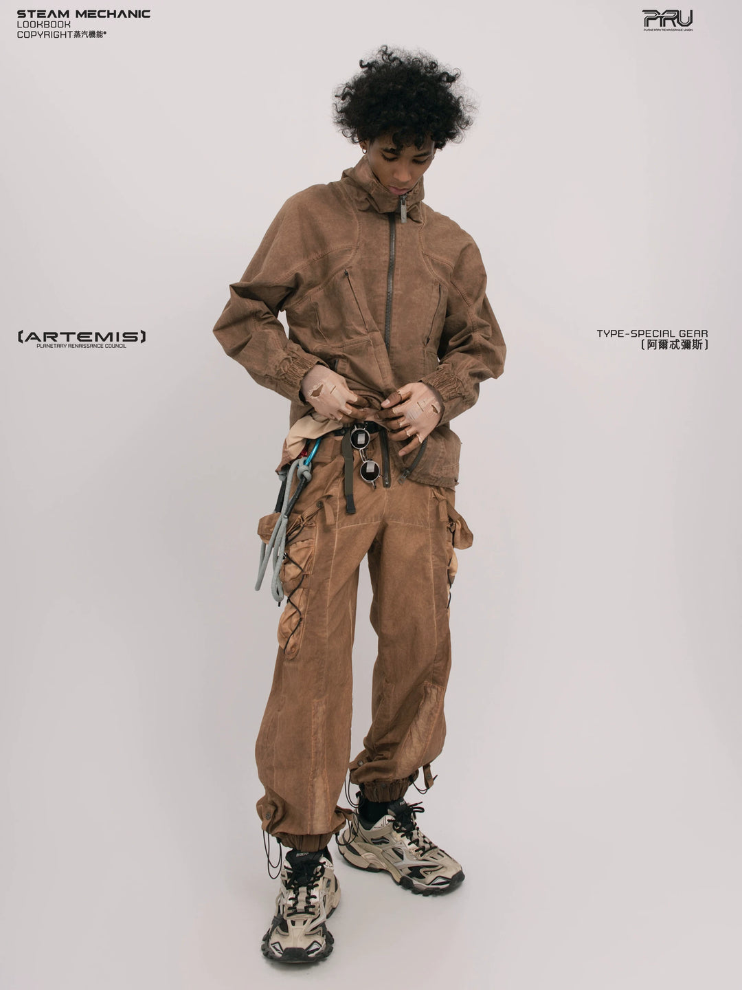 ARTEMIS soft dawn orange tuck-paneled technical jacket — material and silhouette detail