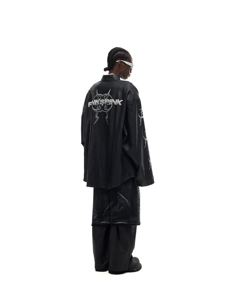 PINKSPINK ELECTRIC MOON coated zip-knee wide-leg pants in black — three-quarter rear styling view with a separate jacket and overshorts