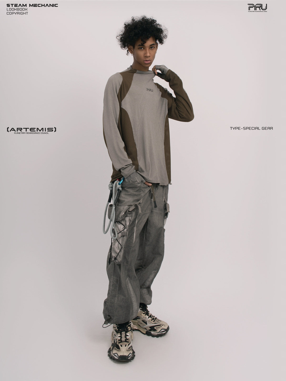 STARCORE ash tundra mesh-panel long-sleeve top b — full-length front modeled view with hand at collar