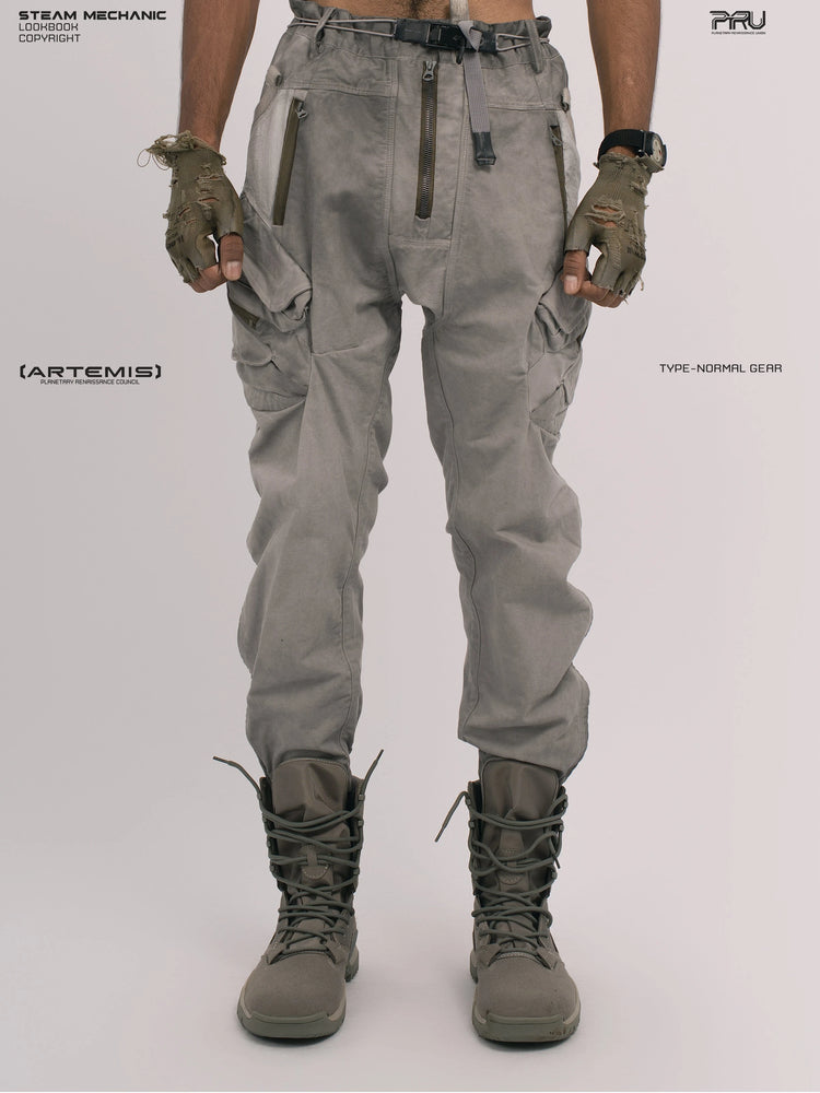 AEGIS lunar sea gray multi-pocket moto pants — front modeled view showing the angled cargo pockets