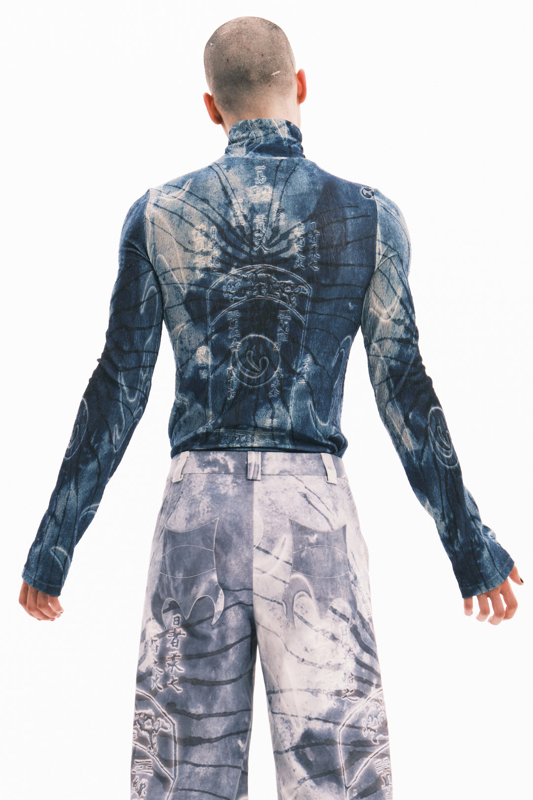 EMBRYO ANCIENT CODE textured mock-neck top — garment-only construction view