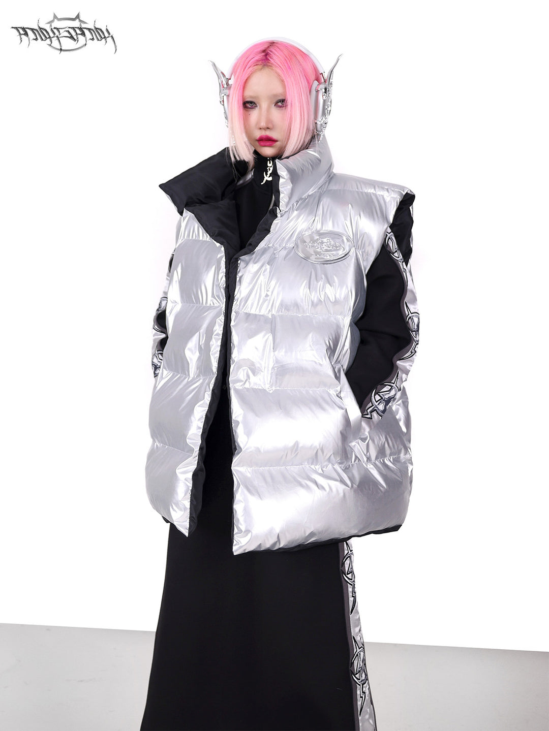 PINKSPINK ORBIT reversible padded vest in black silver — silver-side front modeled close-up corresponding to the hero image