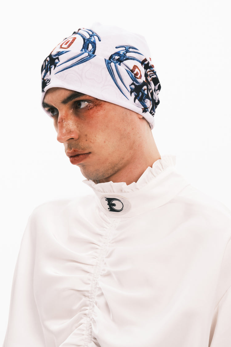 EMBRYO TRIBAL ENTITY graphic slouch beanie — close modeled view