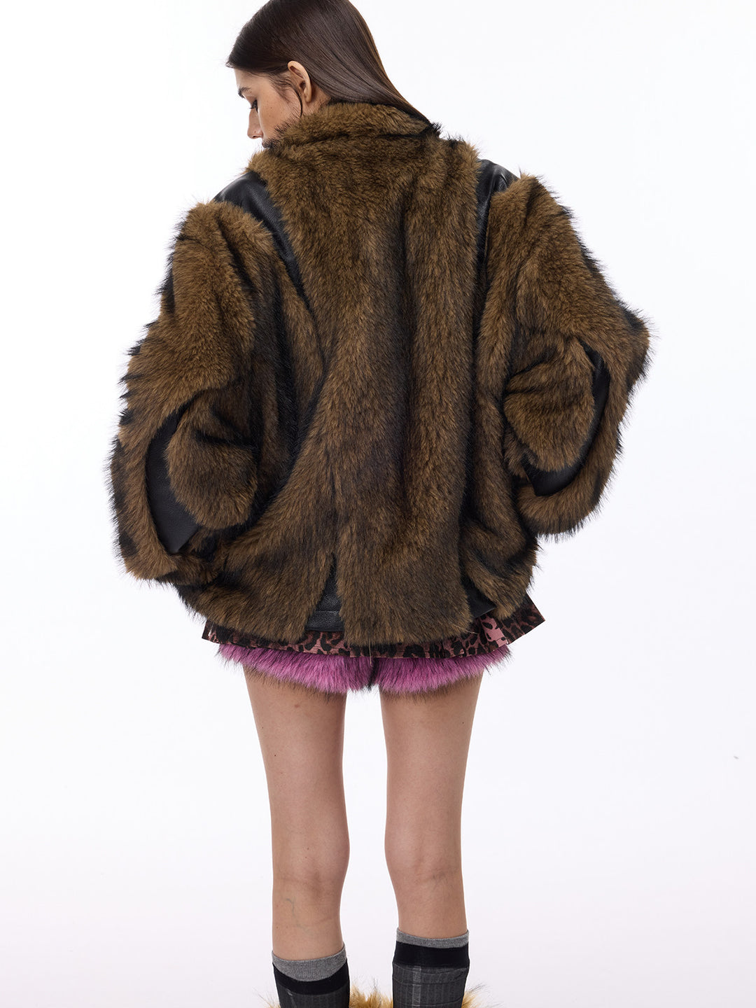 PINKSPINK ELECTRIC MOON paneled faux-fur jacket — back modeled detail of curved construction