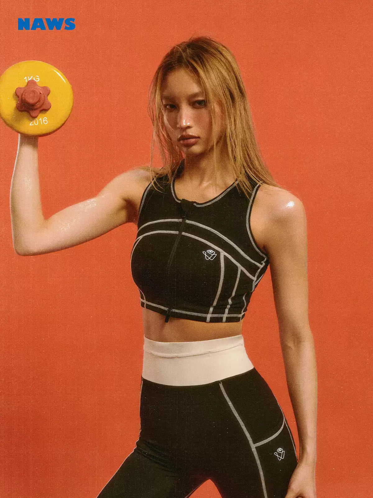 NAWS CLOUD zip-front sports bra — modeled front styling view