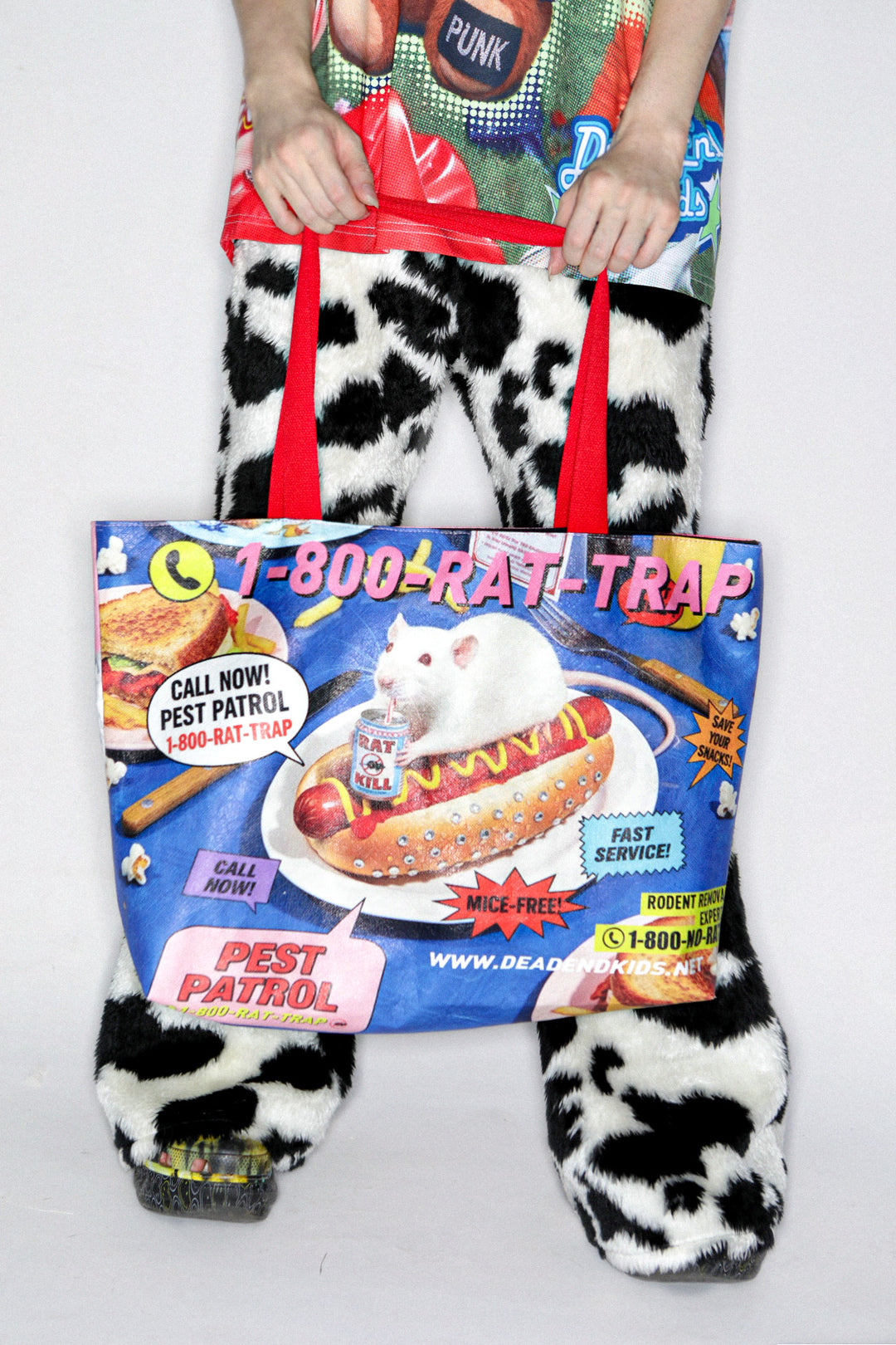 DEADENDKIDS PEST PATROL Tyvek tote bag — full-length modeled view