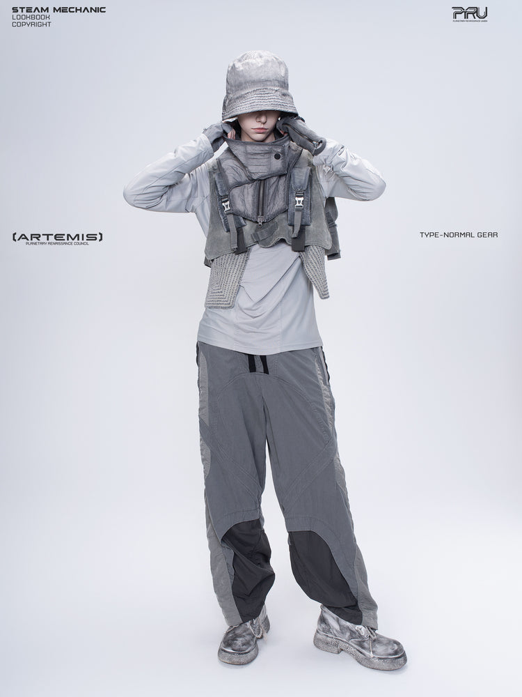 ARTEMIS moon dust gray stretch technical base-layer top — front modeled view with both arms raised