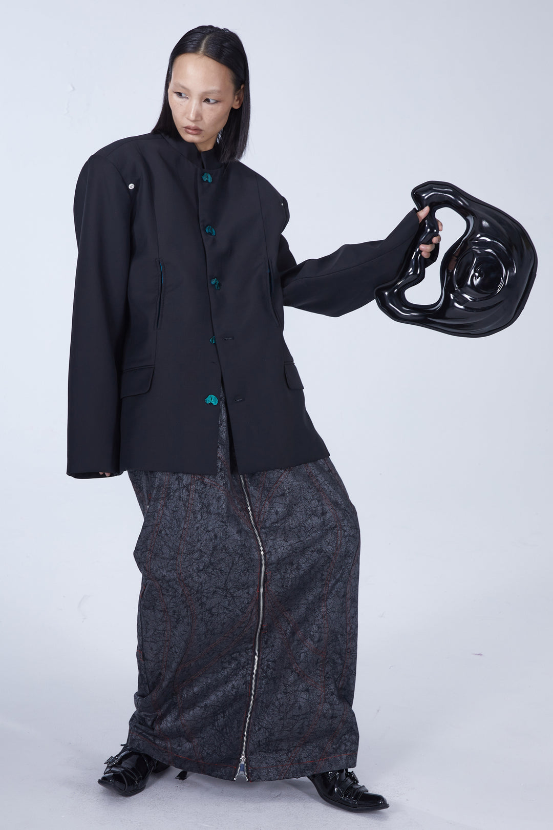EMBRYO GRAVITY sculptural 3D handbag — close modeled styling view
