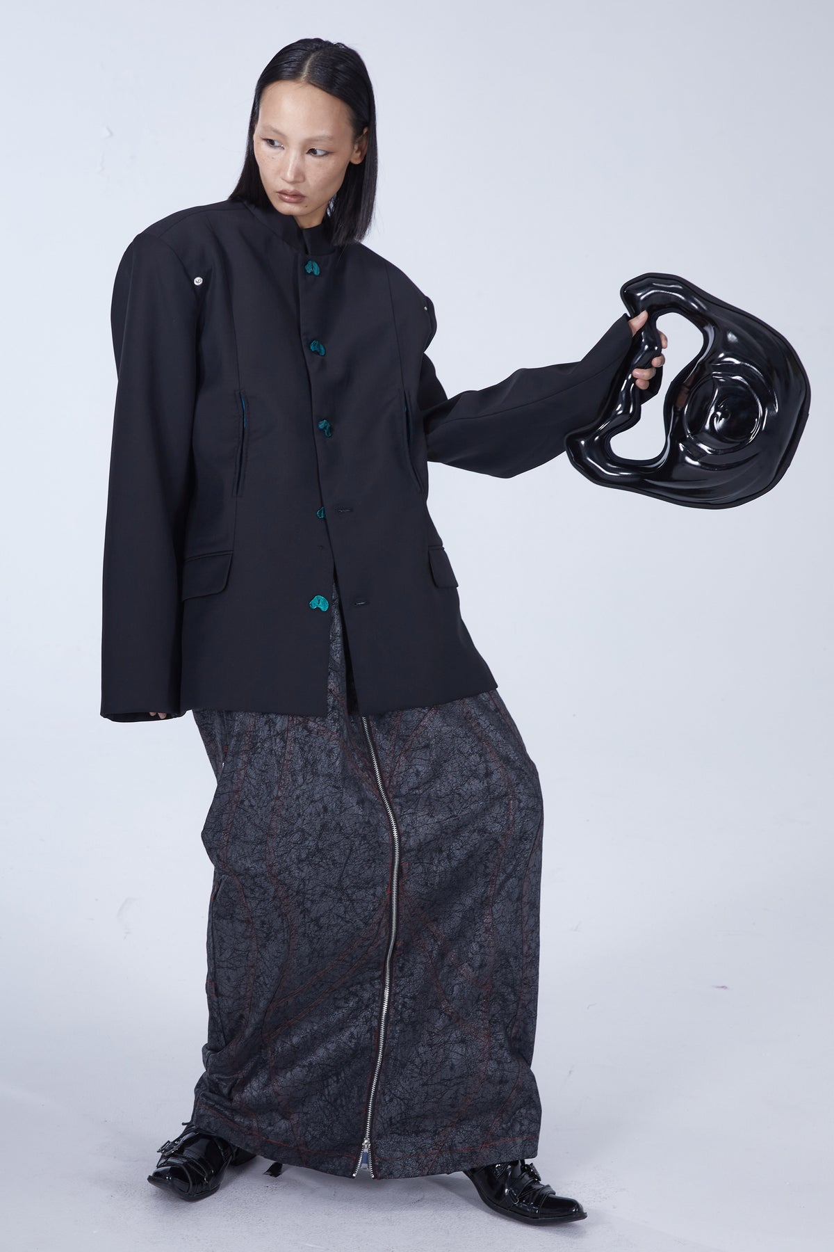 EMBRYO GRAVITY sculptural 3D handbag — close modeled styling view