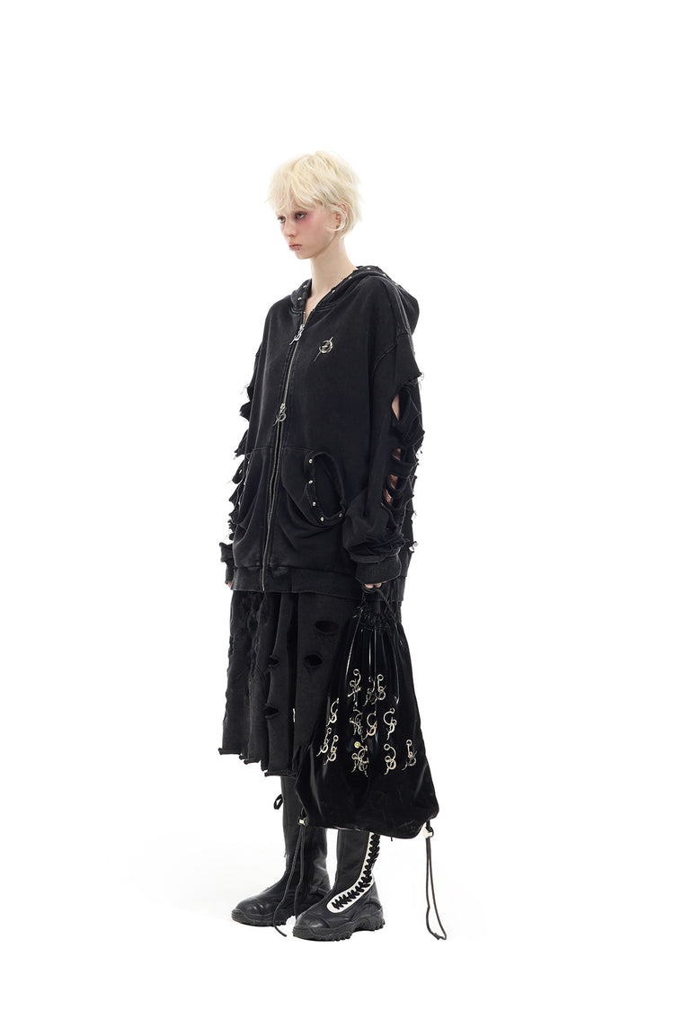 PINKSPINK ELECTRIC MOON distressed embroidered wide-leg shorts — black — side modeled view with hoodie and shoulder bag