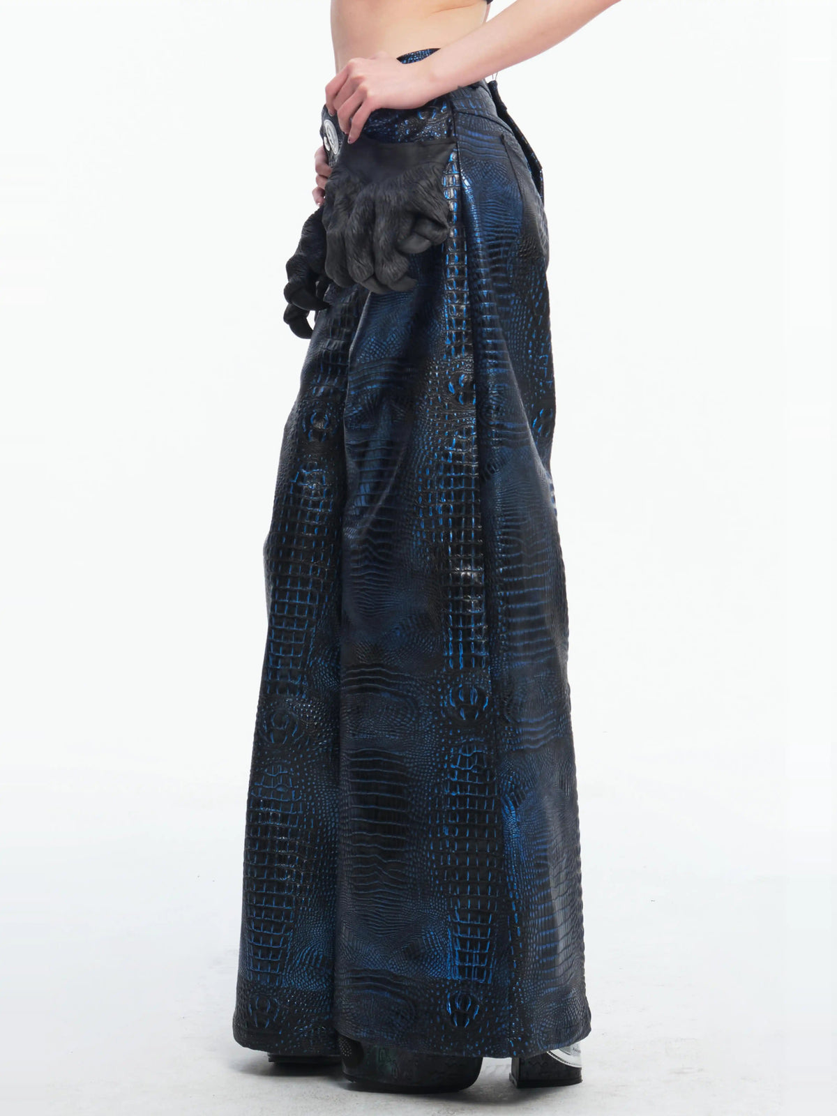EMBRYO CLAW ARMOR crocodile-effect wide-leg pants — angled garment-only view