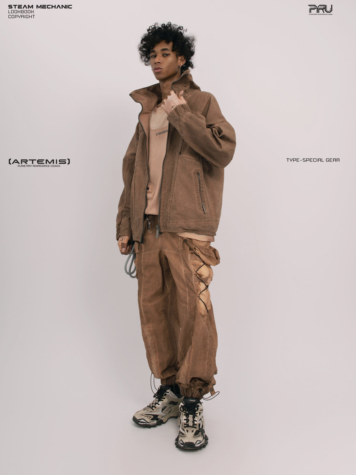 ARTEMIS soft dawn orange tuck-paneled technical jacket — full-length front three-quarter modeled view with jacket open