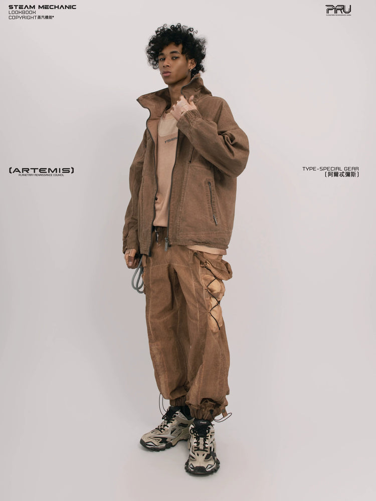 ARTEMIS soft dawn orange tuck-paneled technical jacket — rear modeled view