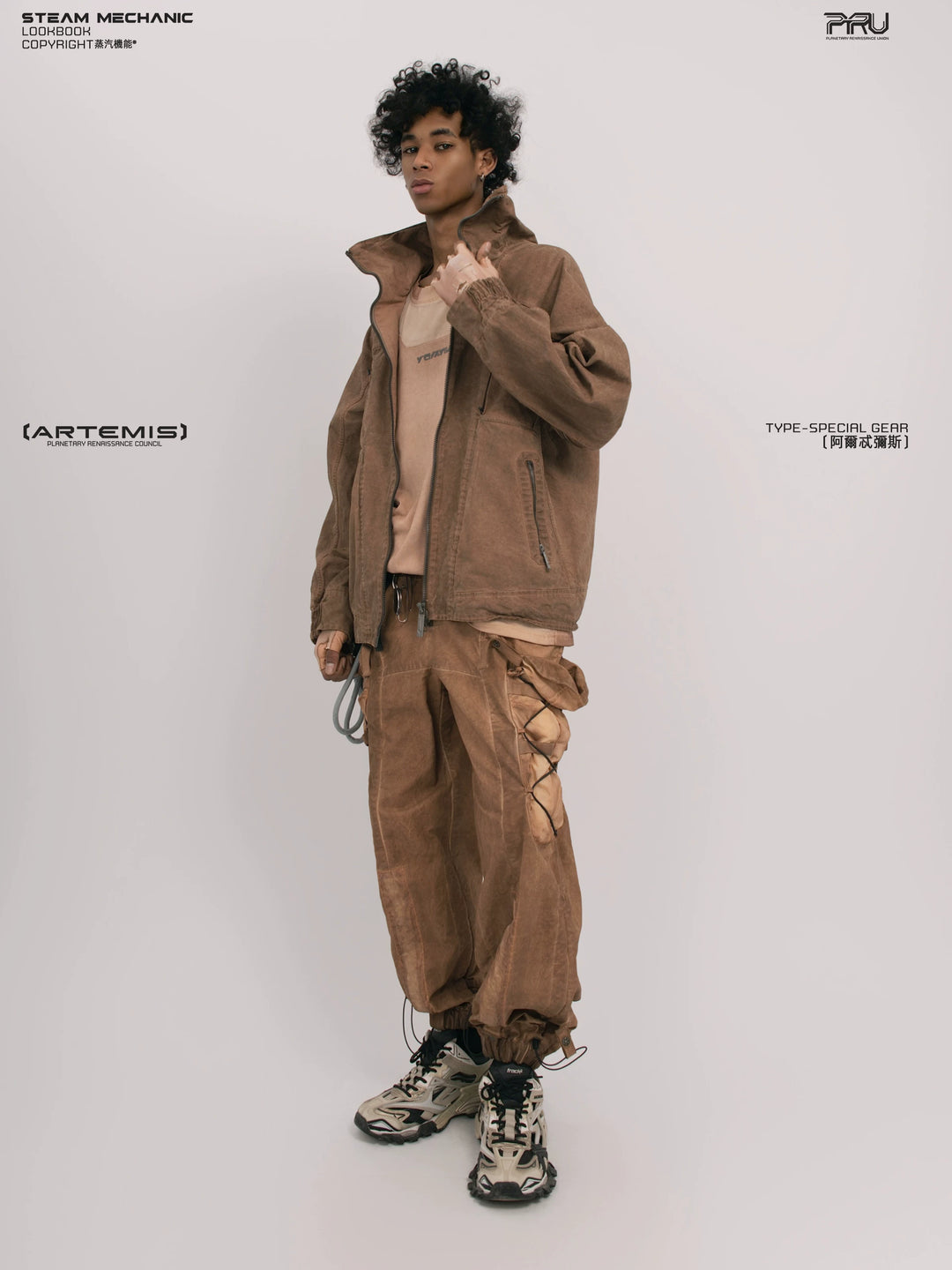 ARTEMIS soft dawn orange tuck-paneled technical jacket — rear modeled view