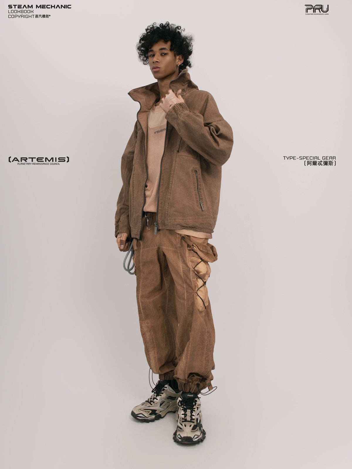 ARTEMIS soft dawn orange tuck-paneled technical jacket — rear modeled view