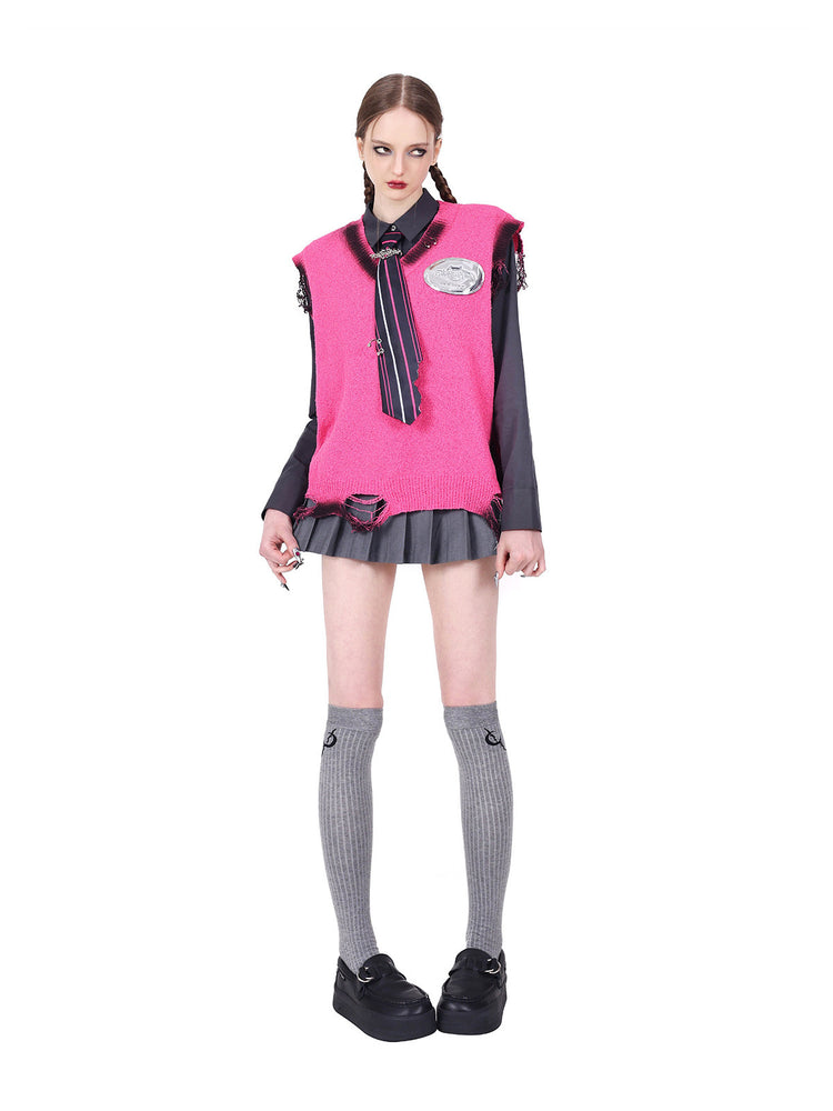 PINKSPINK REBEL distressed ring-detail knit vest in pink — full-length angled front modeled pose used in the hero collage