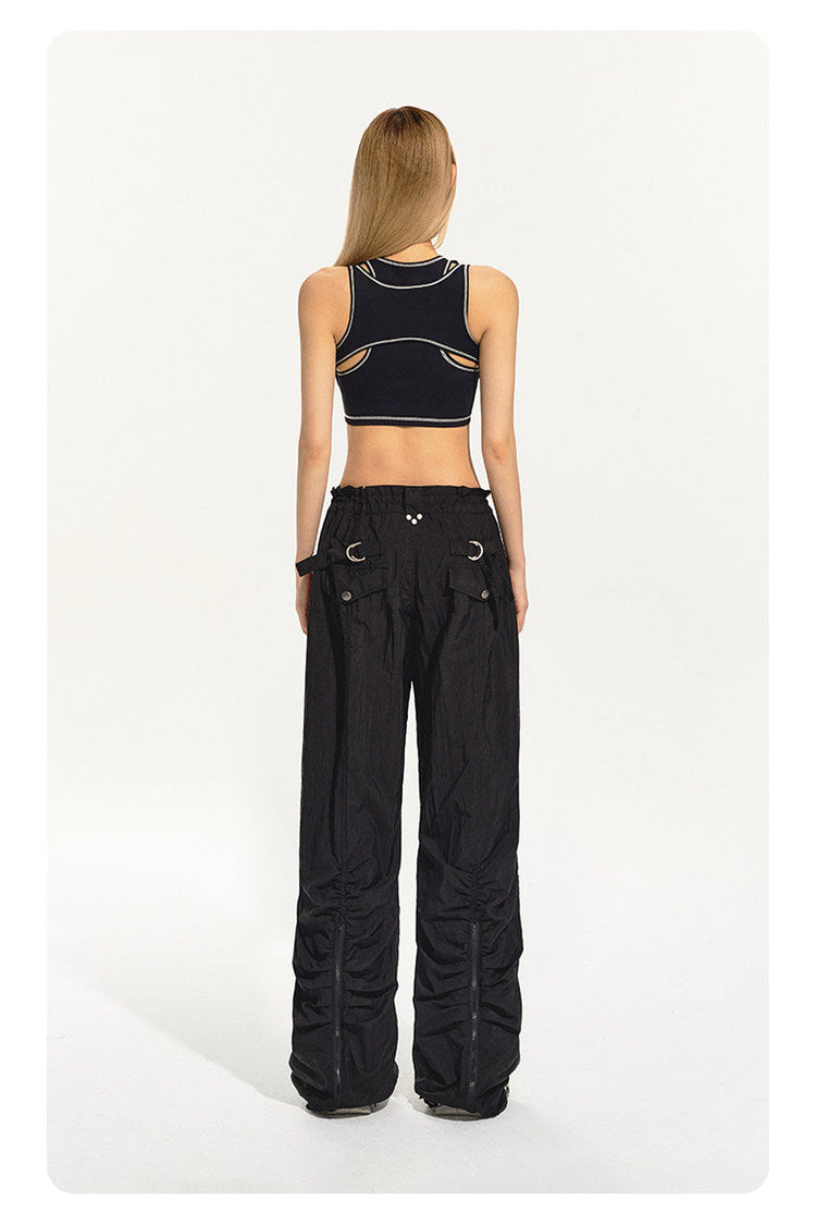 NAWS CLOUD three-proof softshell running pants — modeled detail view of the garment construction