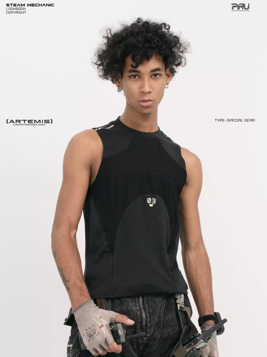 AEGIS blackbird black distressed mesh tank — front three-quarter modeled view holding a radio