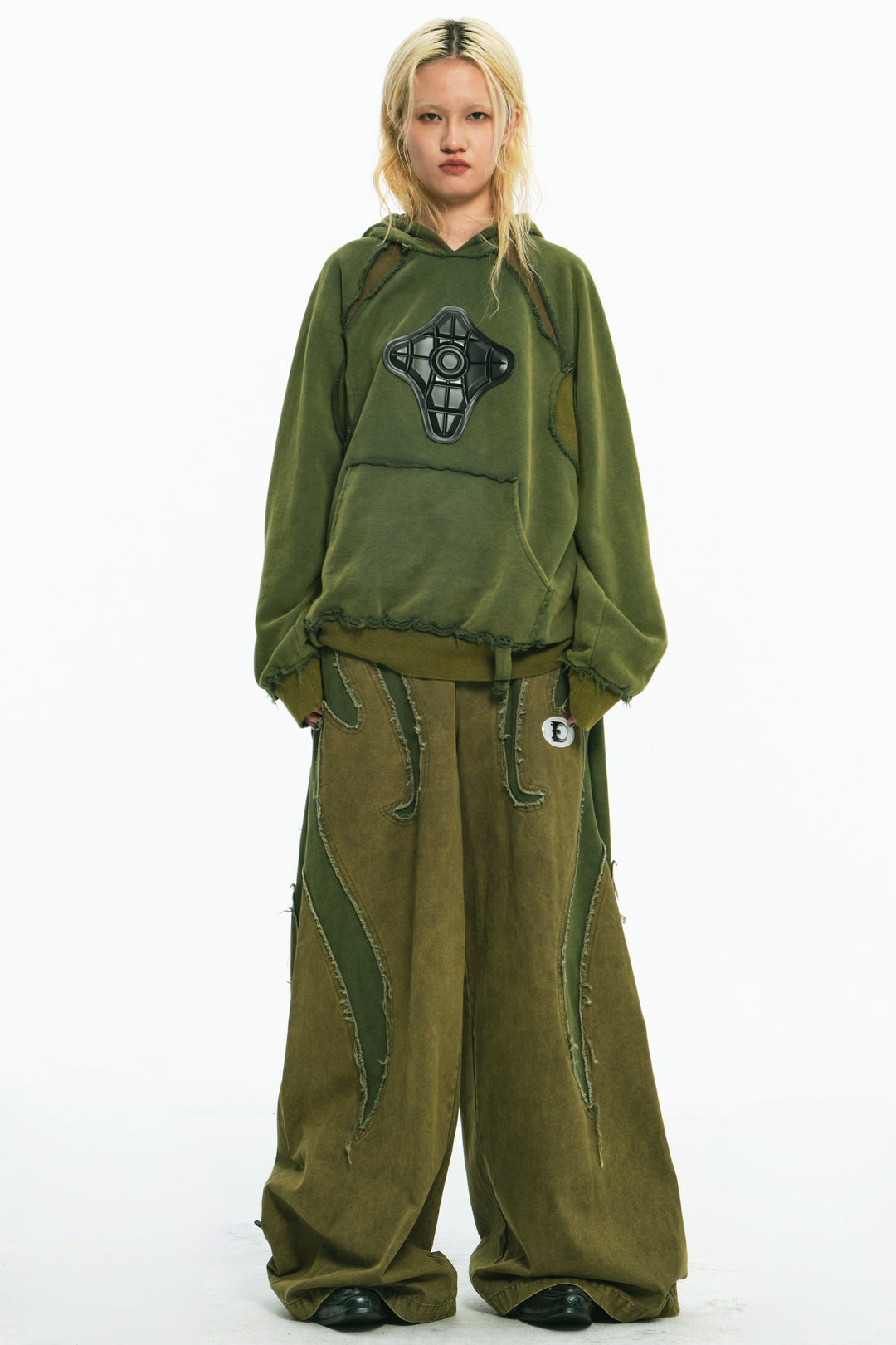 EMBRYO GREEN GUARD distressed armor hoodie — full-length modeled view