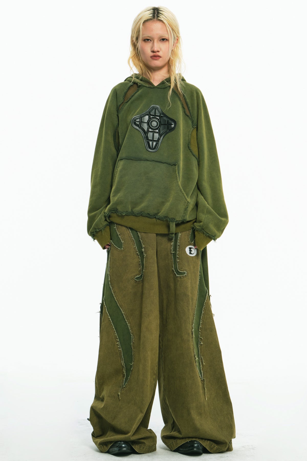 EMBRYO GREEN GUARD distressed armor hoodie — full-length modeled view