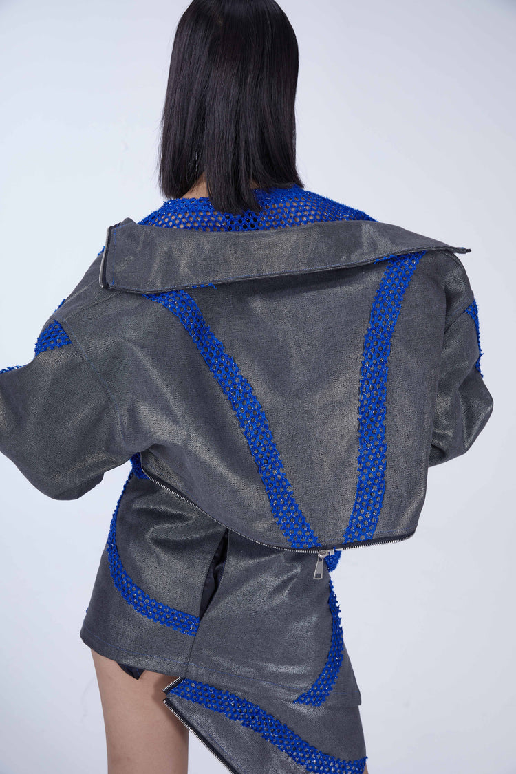 EMBRYO METAL SHELL convertible canvas jacket — material and hardware detail