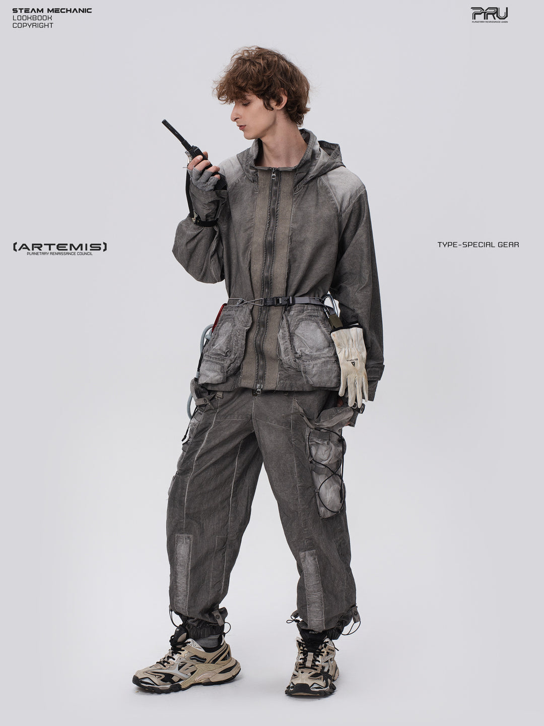 STARCORE meteor gray distressed work jacket — full-length front view holding a radio