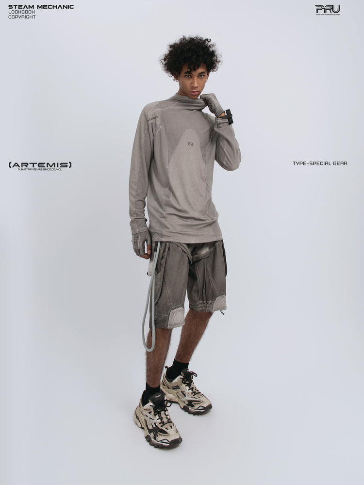 STARCORE mesh-panel long-sleeve top in dusk cloud gray — full-length three-quarter modeled view with collar lifted