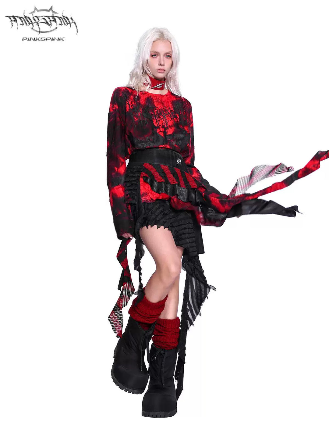 PINKSPINK ELECTRIC MOON layered striped mesh mini skirt — black and red — raised-leg pose showing flowing asymmetric panels