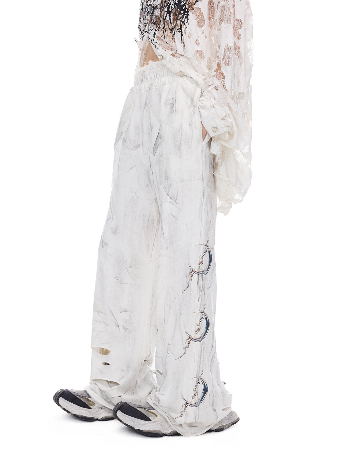PINKSPINK ELECTRIC MOON coated distressed flare sweatpants — catalog view showing the design and silhouette