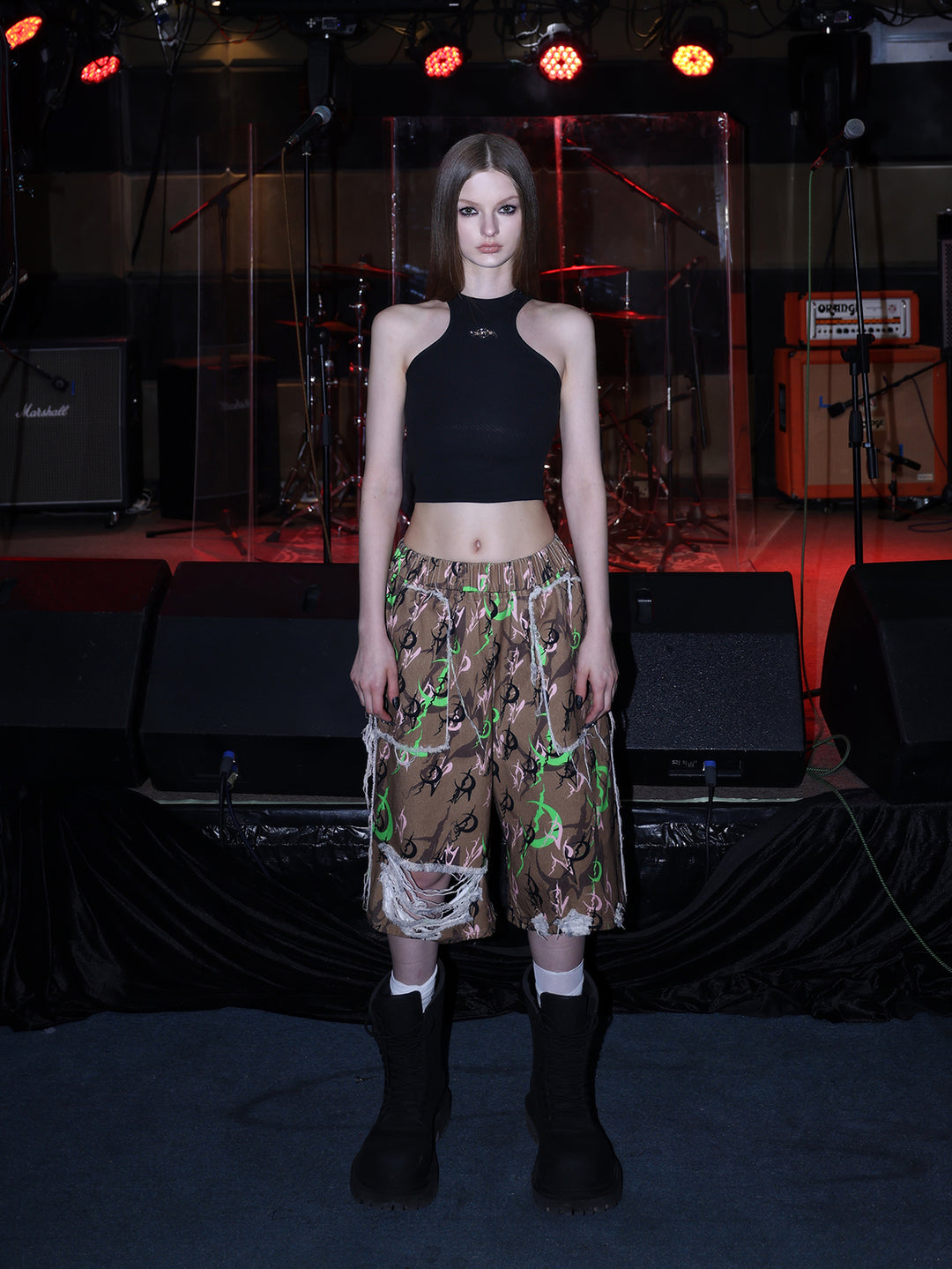 PINKSPINK ELECTRIC MOON distressed camo cropped trousers in CAMOUFLAGE — full front with halter top.