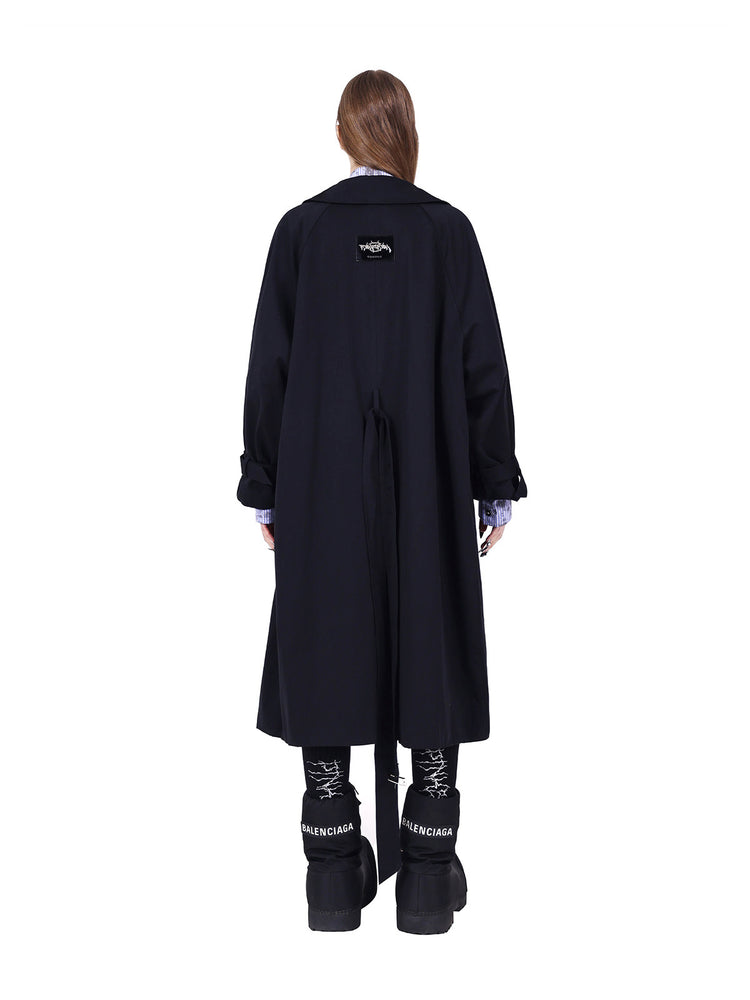 PINKSPINK ELECTRIC MOON reversible patchwork trench coat in black — full-length rear view showing the back vent and brand patch
