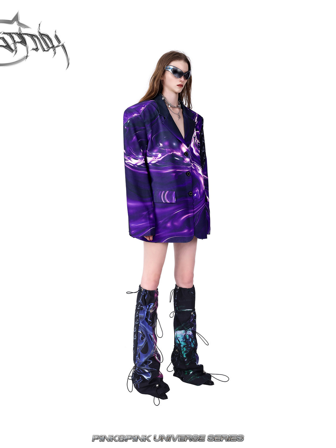 PINKSPINK COSMOS drawcord patchwork leg warmers in black purple multicolor — alternate side modeled view styled with a purple blazer